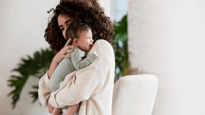 vrouw met huilende baby