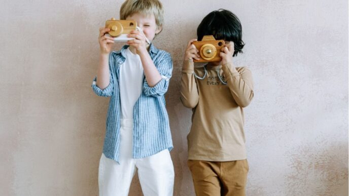 verbod op kidfluencers foto van kinderen met camera