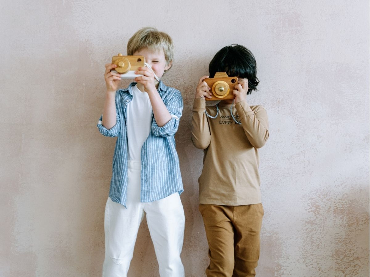 verbod op kidfluencers foto van kinderen met camera