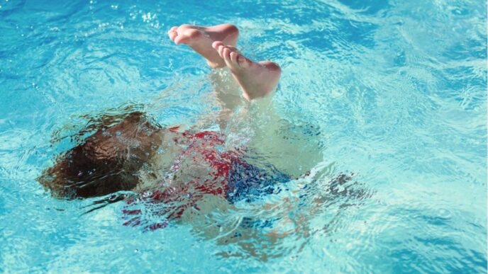 zoon durft niet onder water foto van een zwemles